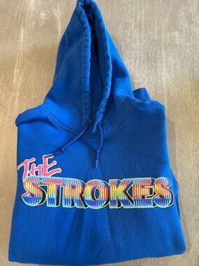 The Strokes Concert Merch Blue Graphic Band Hoodie  Bold Logo Design medium